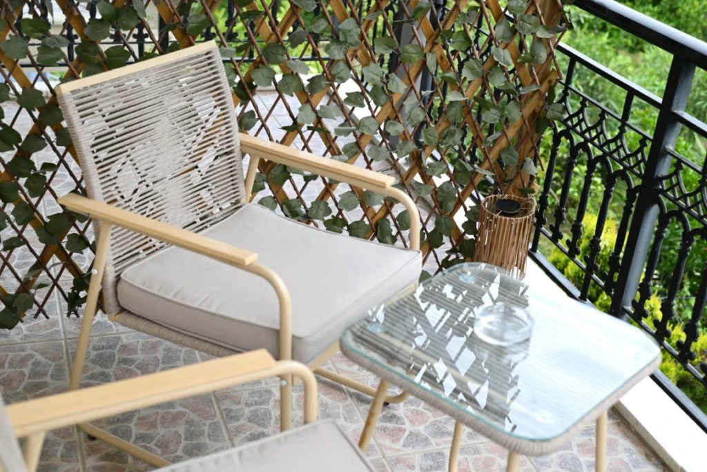 Emocean apartments balcony area with chairs table