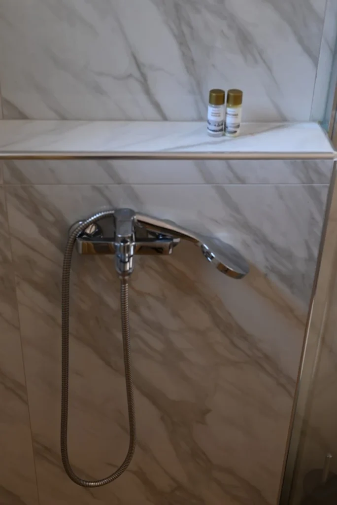 Emocean apartments bathroom shower with essentials
